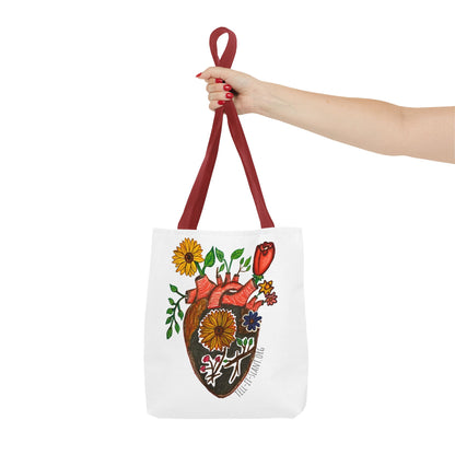 Bolsa de tela literaria única con corazón anatómico y flores en crecimiento
