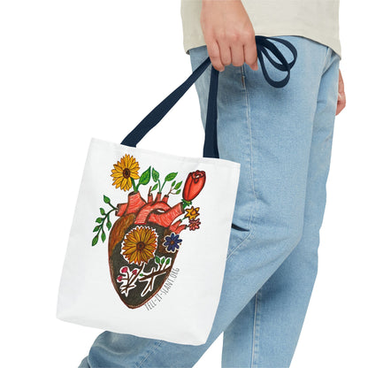 Bolsa de tela literaria única con corazón anatómico y flores en crecimiento